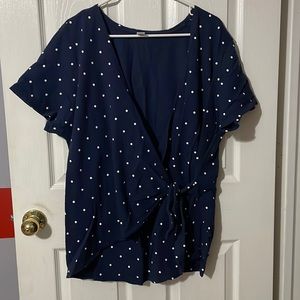 Short sleeved wrap around shirt.